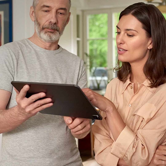 men and women is discussing and looking in to the tablet 