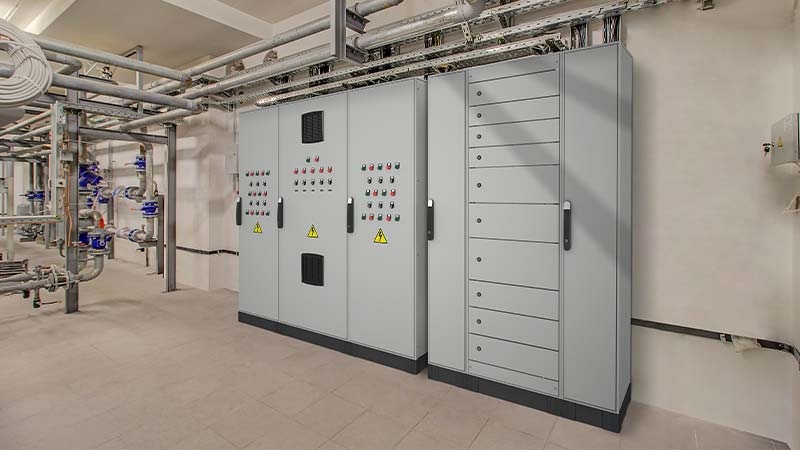 A large grey cabinet with buttons and switches