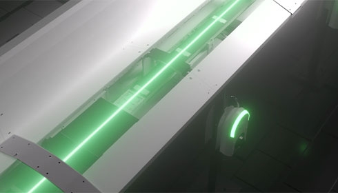 A green light on a white surface