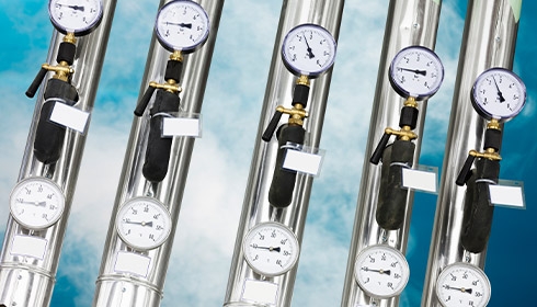 Several gauges on a metal pipe