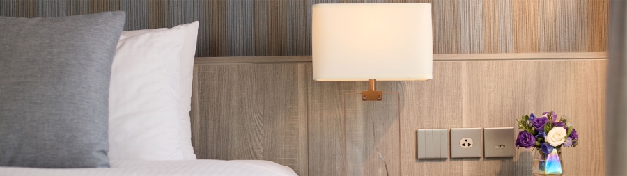 Unica X switches in bedroom.