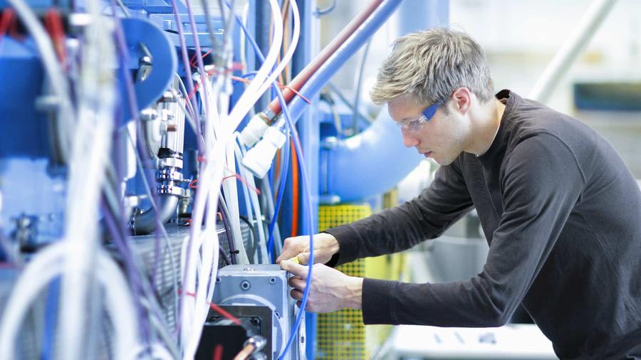 Technician working on network for cloud service providers