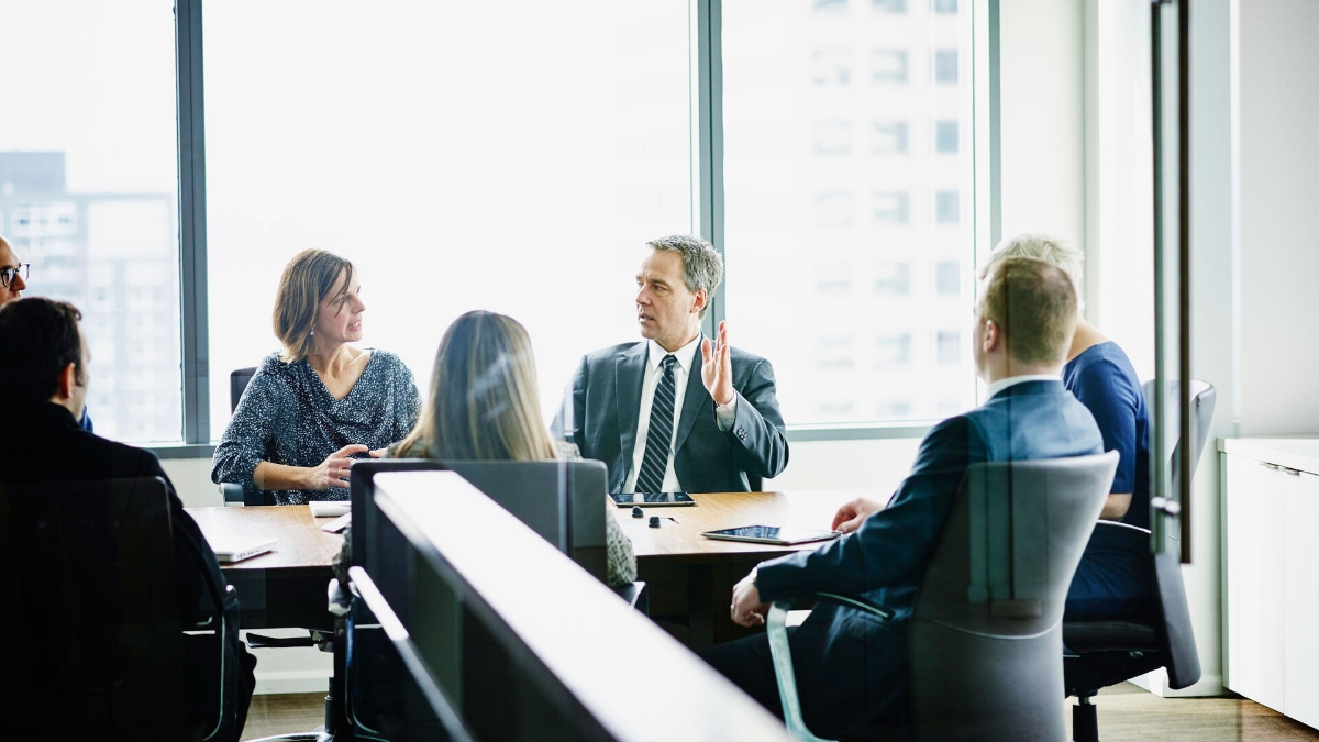 Mature male business executive leading project discussion 