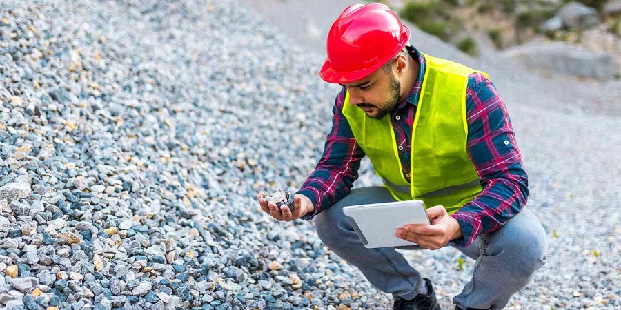 boy with tablet in mountain area