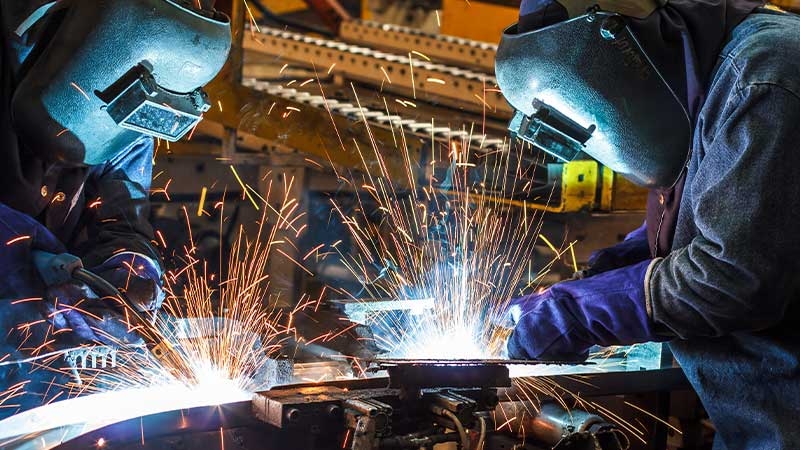 A group of people welding