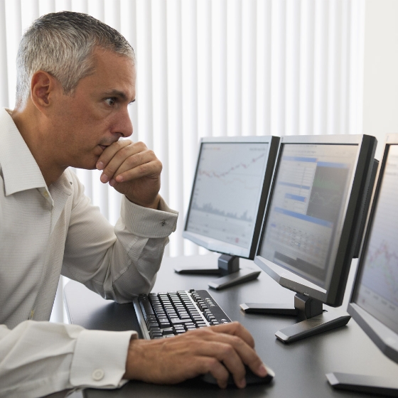 man working with desktop