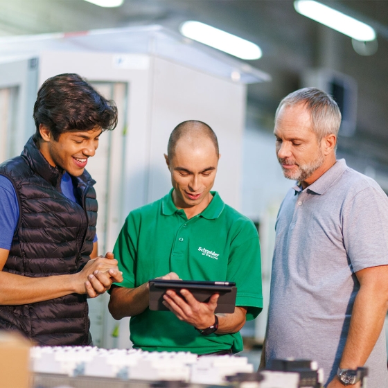 three person use tablet 
