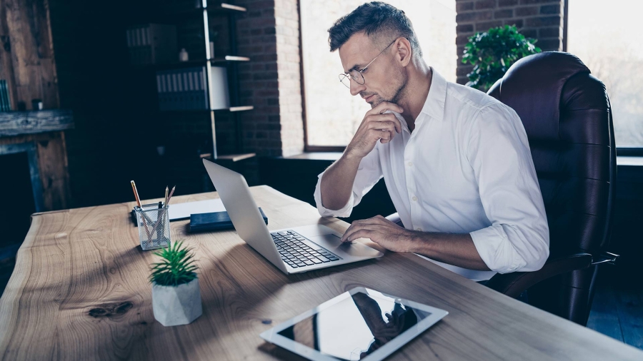 man working on laptop