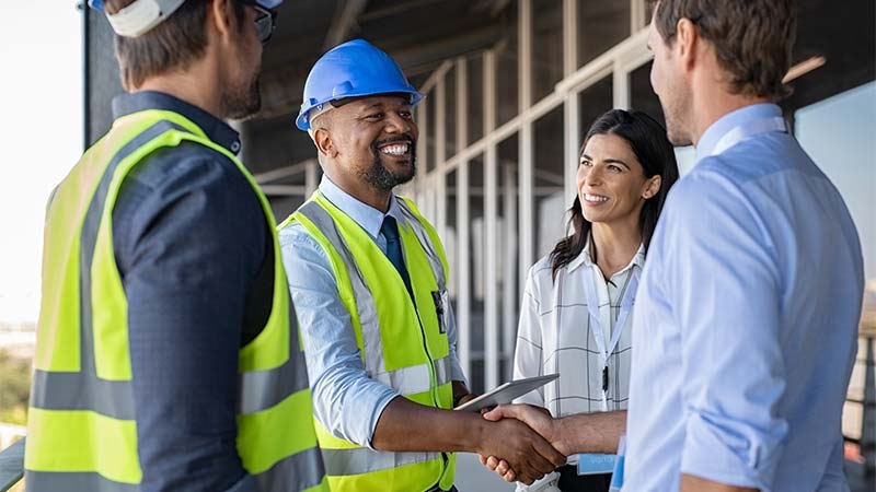 A group of people shaking hands