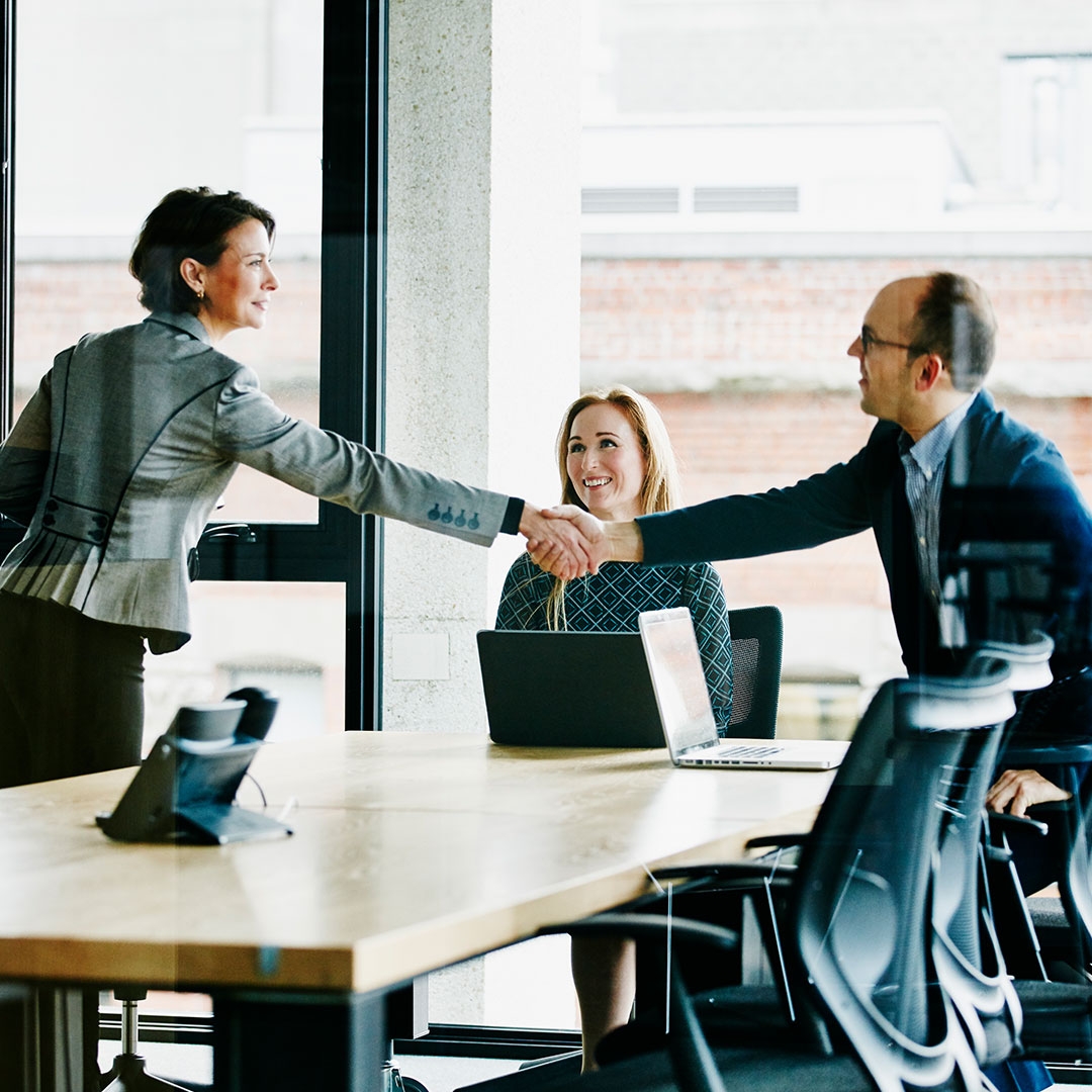 Handshake in business meeting