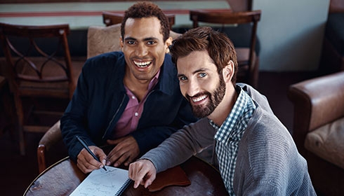 Two men working together