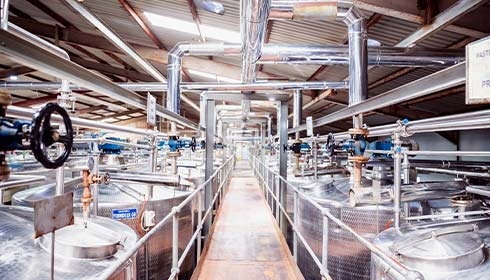 A large metal tanks in a factory