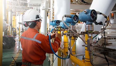 A person working on a machine