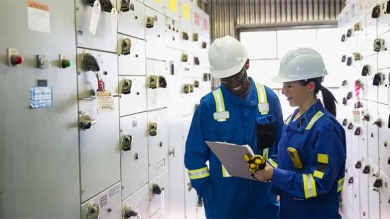 A few workers in a room