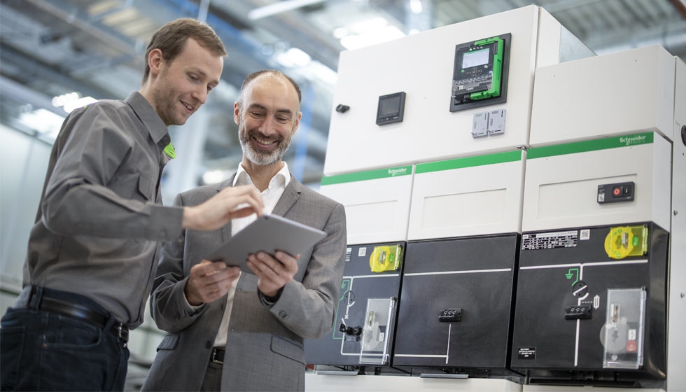 Two men with a tablet