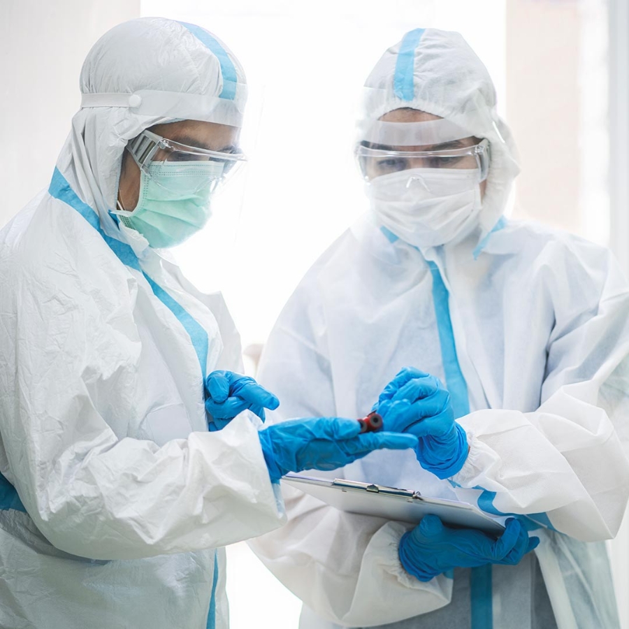 Two hospital workers in PPE