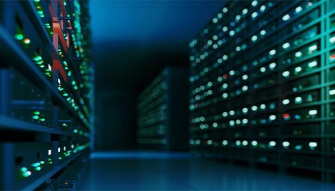 A blurry image of a server room