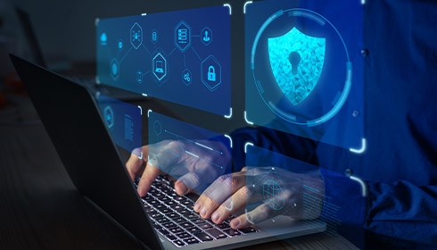 A person typing on a computer