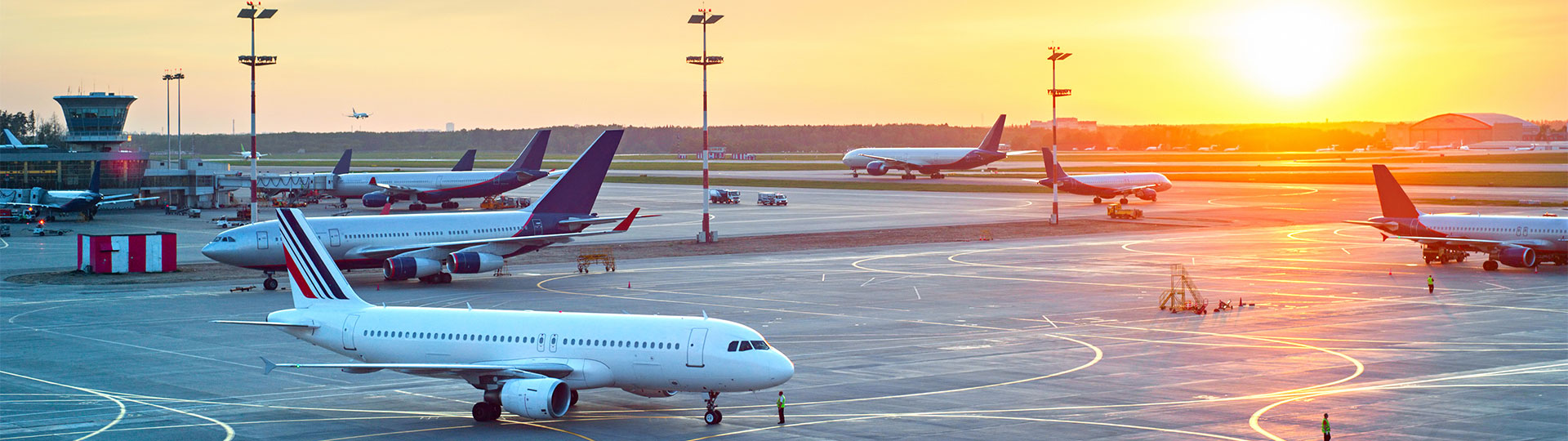 Modern airport at sunset.