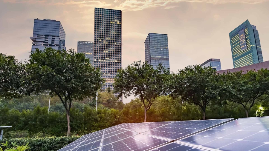 Solar panel plant with urban landscape