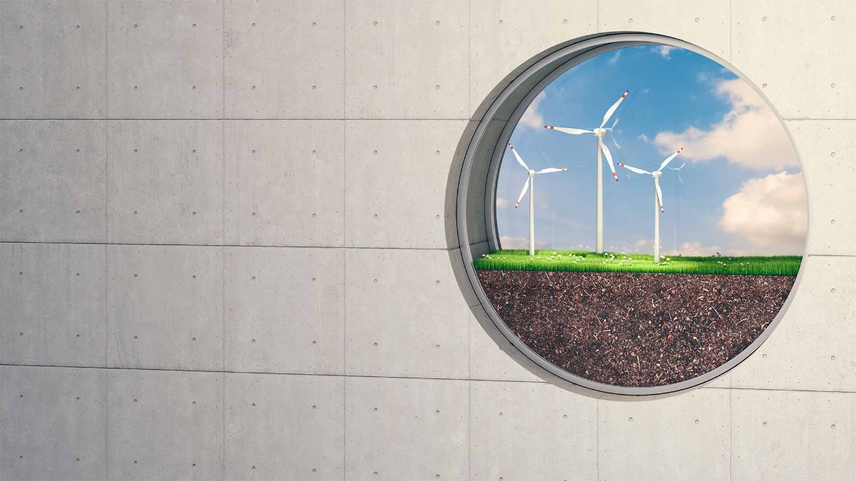 A circular window with a group of wind turbines