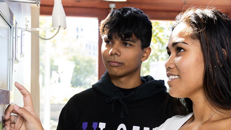 A person and person looking at each other